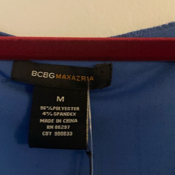 Cute flowy BCBG blue tank with white floral stitching. - Picture 2 of 2